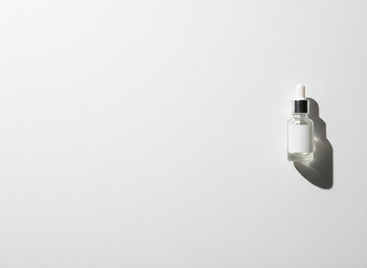 Skin barrier repair Singapore — a single unlabelled dropper bottle on a white surface, Roses & More Skin Alchemy